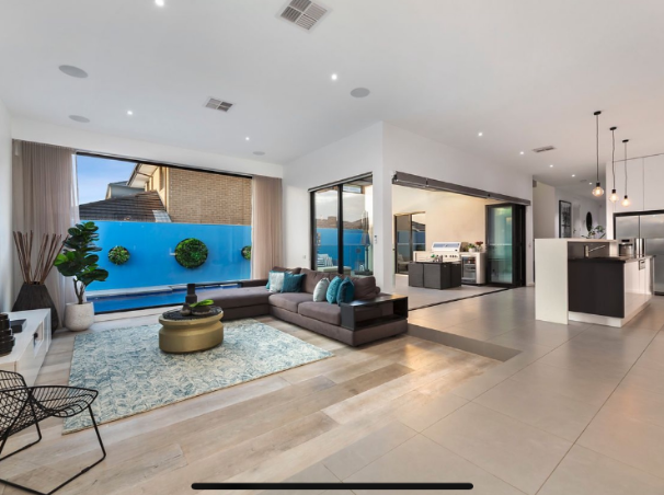 Open-plan poolside living area built by Blake Ballard Building on the Central Coast.